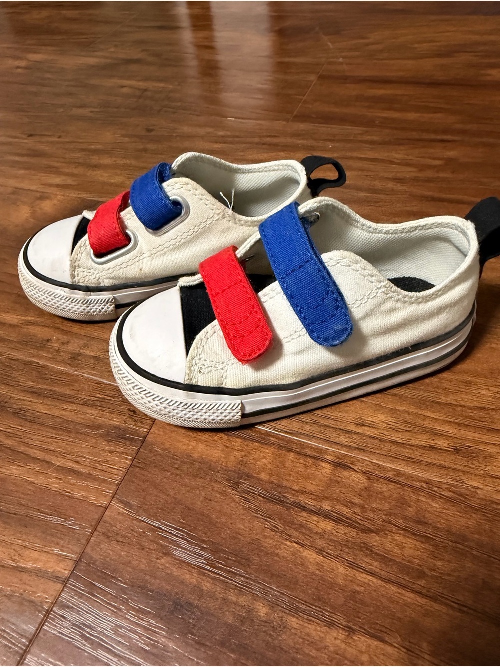 Toddler Converse White Canvas Sneakers with Black Tongue and Red & Blue Straps